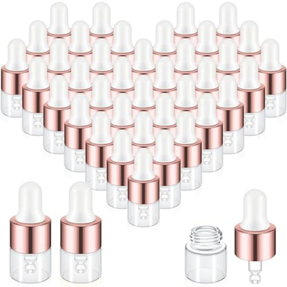 Didaey 100 Pcs 1/2/3/5/10/15 ml Mini Glass Oil Dropper Bottle Bulk, Clear Essential Small Empty Bottles Sample Containers Perfume Liquid Vials with Cap for Traveling (1 ml,Rose Gold) - color: Rose Gold, size: 1 ml
