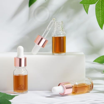 Didaey 100 Pcs 1/2/3/5/10/15 ml Mini Glass Oil Dropper Bottle Bulk, Clear Essential Small Empty Bottles Sample Containers Perfume Liquid Vials with Cap for Traveling (10 ml,Rose Gold) - color: Rose Gold, size: 10 ml