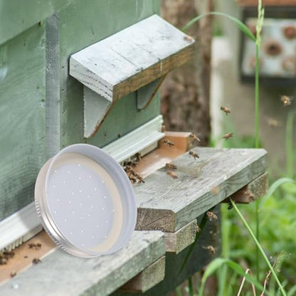 Happyyami 4pcs Entrance Feeder Beehive Feeder Lids Honey Bee Feeder Mason Jar Lids Plastic Bee Hive Entrance Feeder with Perforated Lids Beekeeping Perforated Lid Fits Mason Jars